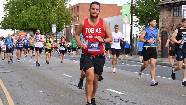 Volunteer runs 3.5 marathons in 5 weeks for Charity