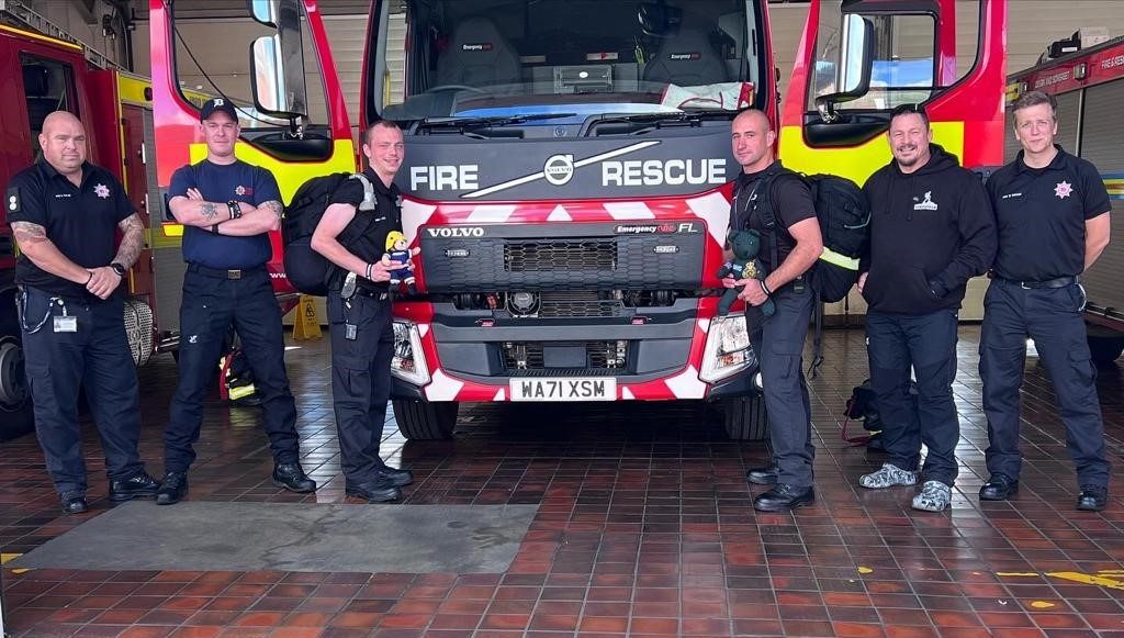 Ex firefighter joins frontline personnel for charity march