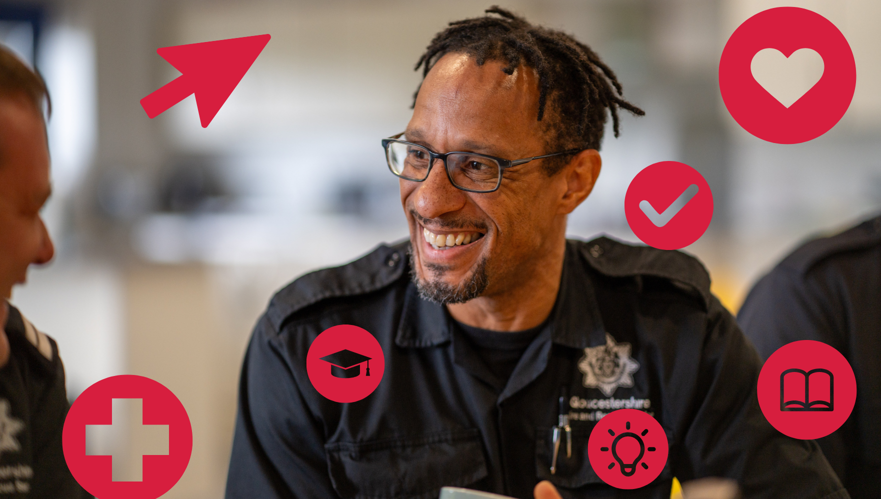 A smiling man in a uniform sits indoors, surrounded by red icons including a heart, check mark, lightbulb, arrow, cross, graduation cap, and open book. He appears to be engaged in a friendly conversation. 