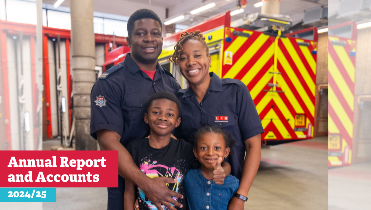 A smiling man and woman in firefighter uniforms stand in a fire station with two young children in front of them. In the background, fire trucks with red and yellow chevrons are visible. Text reads 