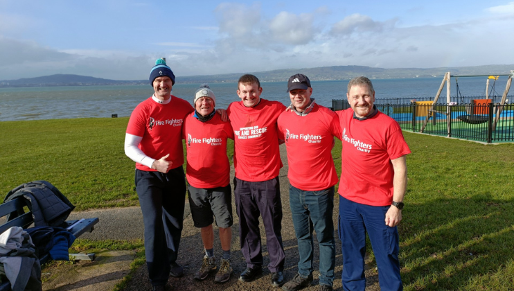 Five men wearing red 